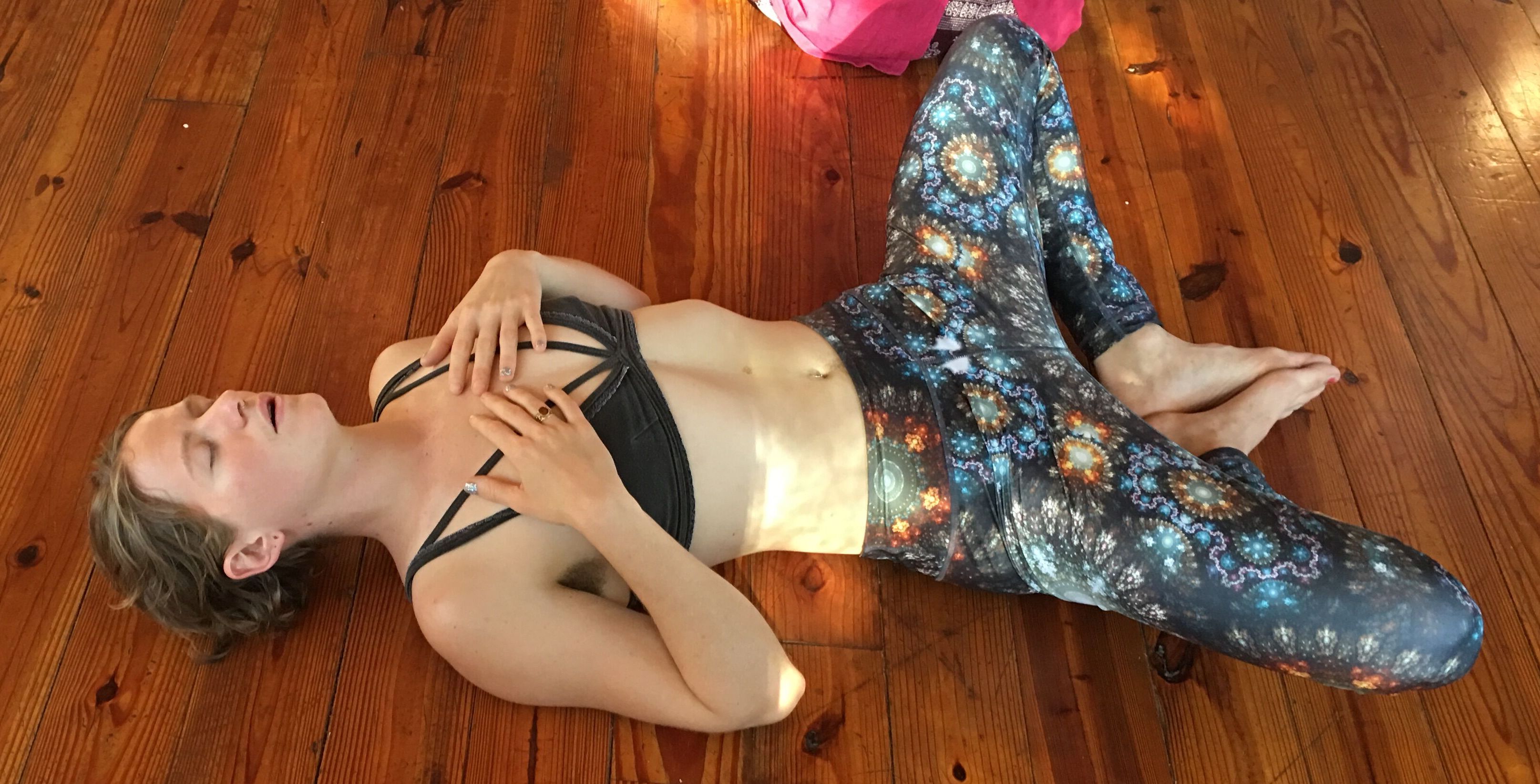 eft tapping tips blog post woman laying on floor yoga breathing